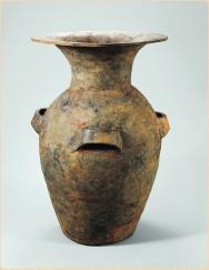 The featured jar was excavated in 1988 from the earthen fortress called Mongchon toseong in Seoul. The 59-centimeter-tall jar is one of the most common types of earthenware from the ancient Korean kingdom of Koguryo. Characteristics distinctive to this type of pottery include the long neck that flares at the rim and the four band-shaped lugs.